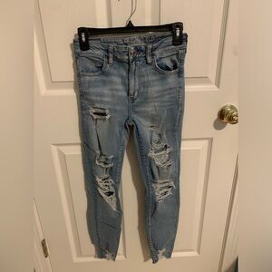 Size 4, light wash distressed skinny jeans from american eagle